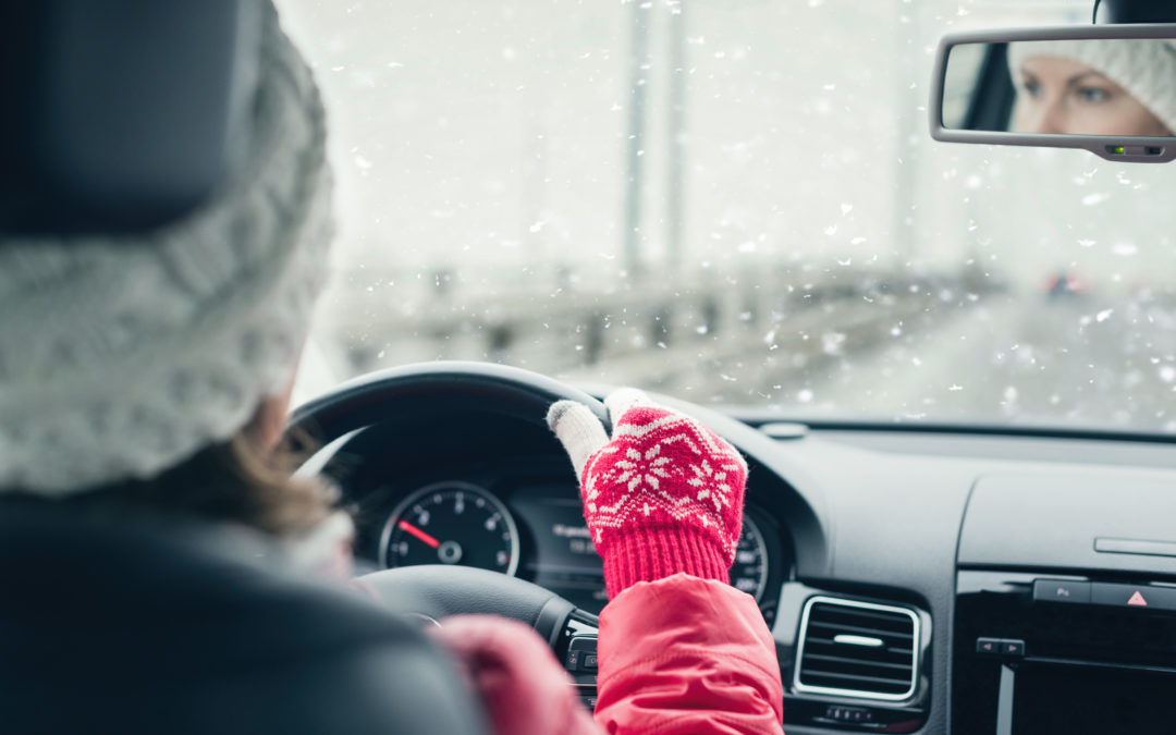 woman behind the wheel on winter roads
