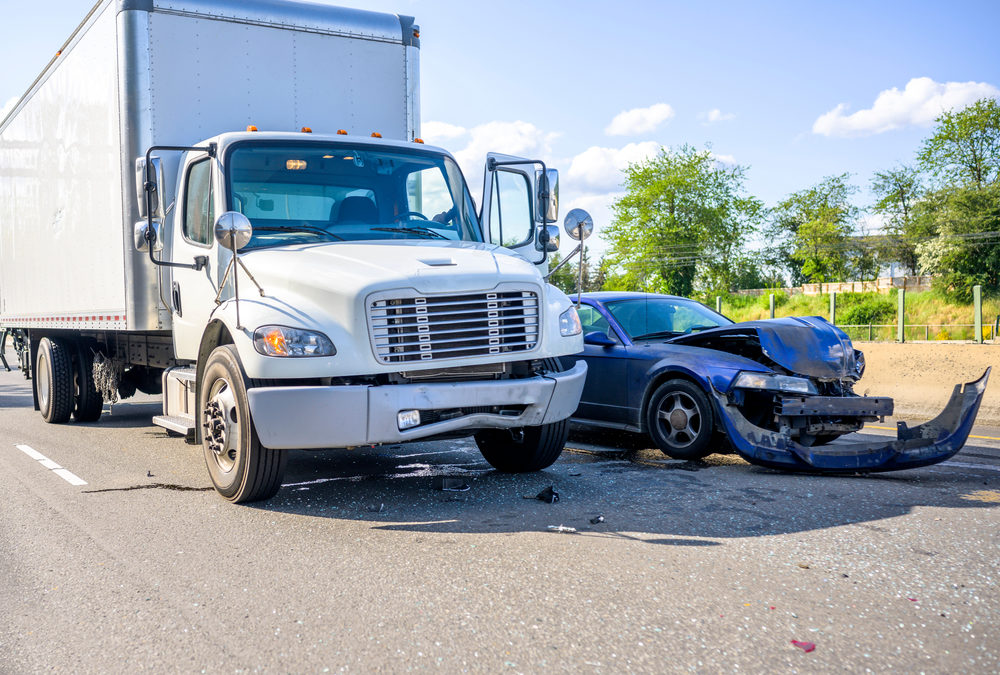 Accident scene with a car and truck damaged - Lasky Justus Law - Your Savannah Law Firm for Personal Injury & Truck Accidents